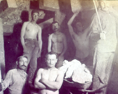 Miners in an underground mine