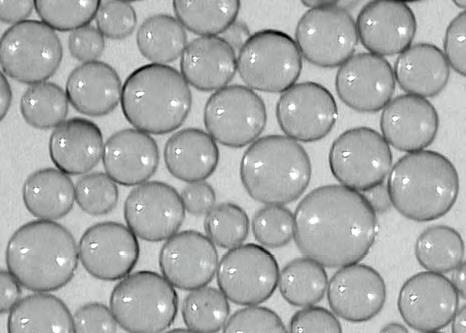 Extreme close up of HGMs on a white background