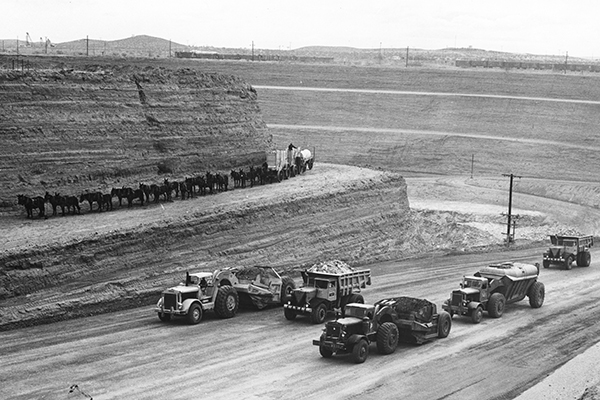 The 20 Mule Train with haul trucks in the 1960s open pit mine at Boron